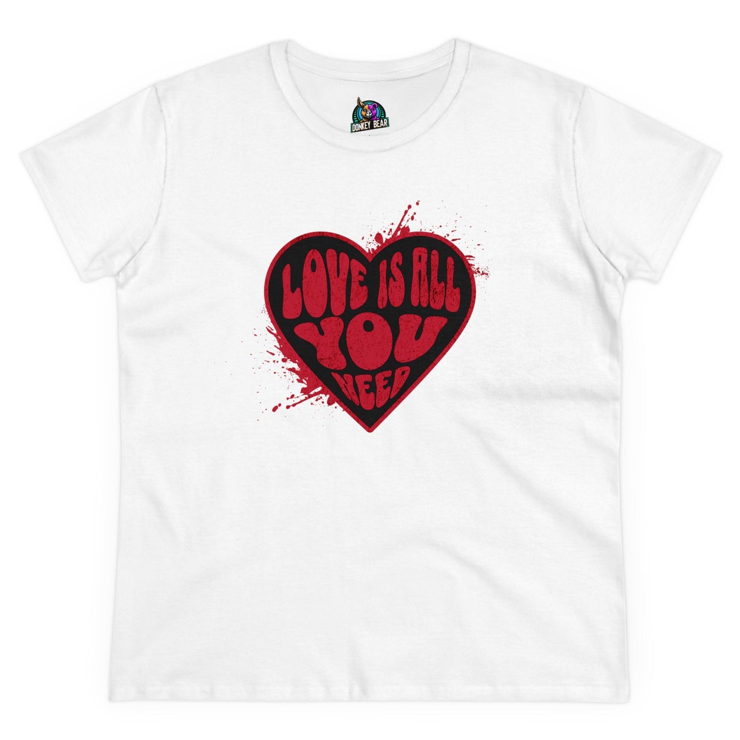 White T-shirt with a red heart displaying the text "Love Is All You Need".